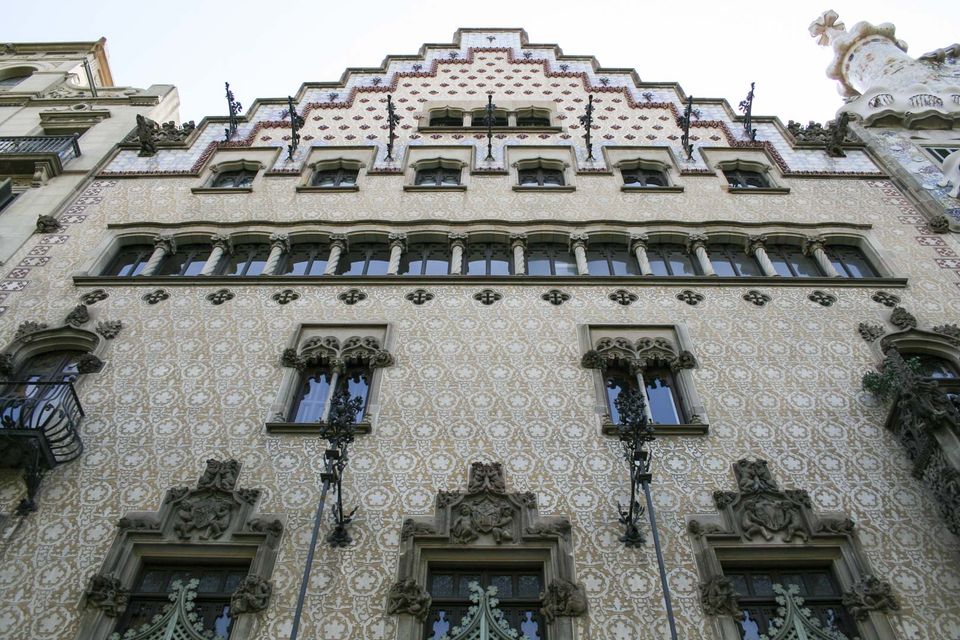 Patterned stepped-gable facade with carved window frames