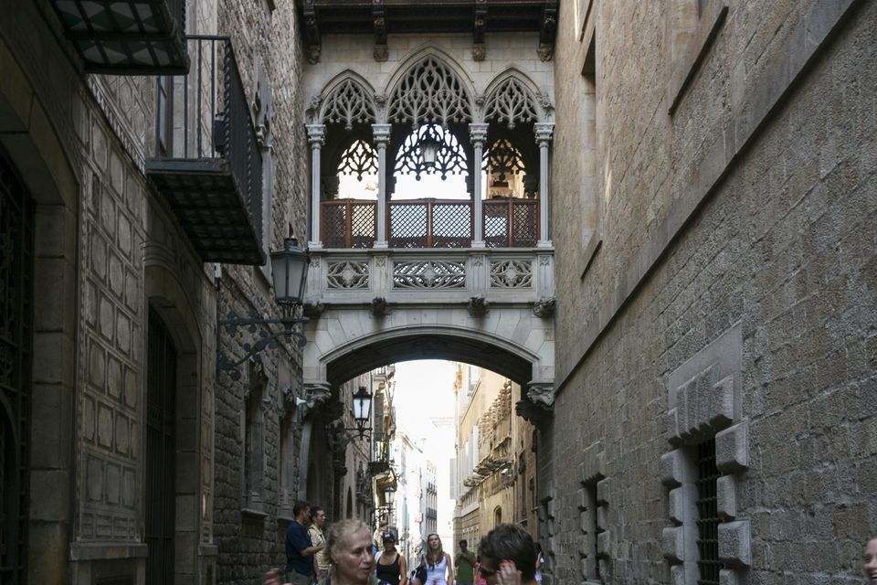 Gothic bridge across a narrow street in the old town