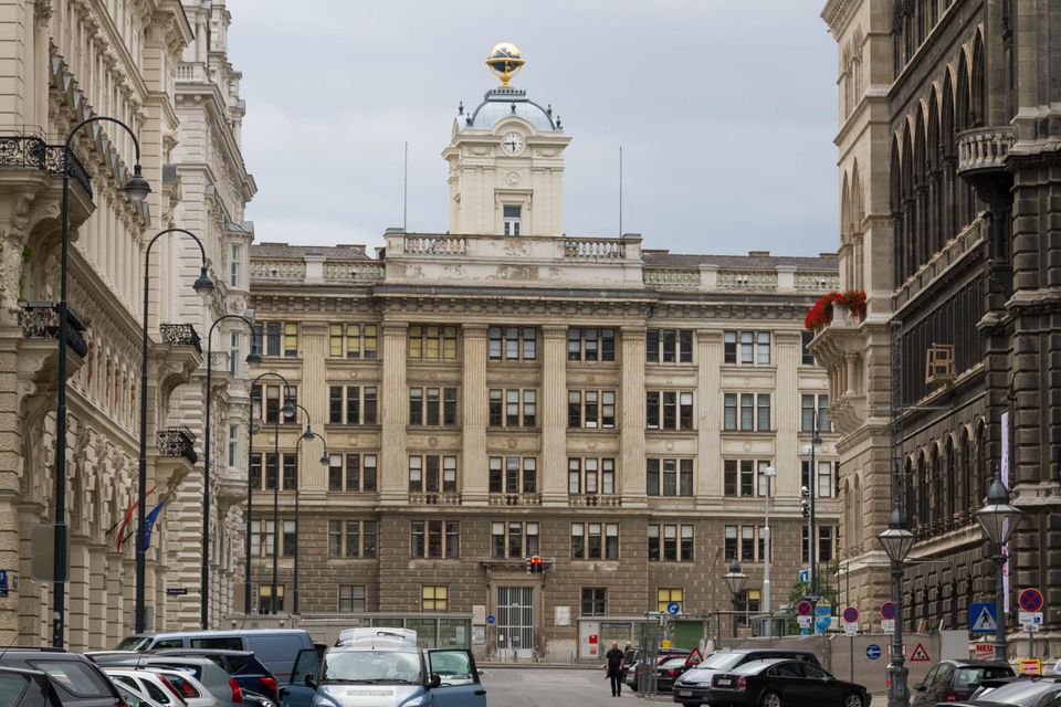 Cream administrative building topped by a gilded globe