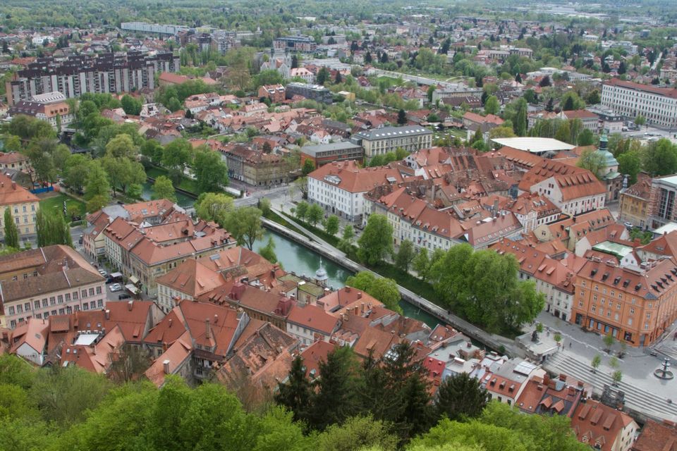 Red-roofed old town following the bend of the river