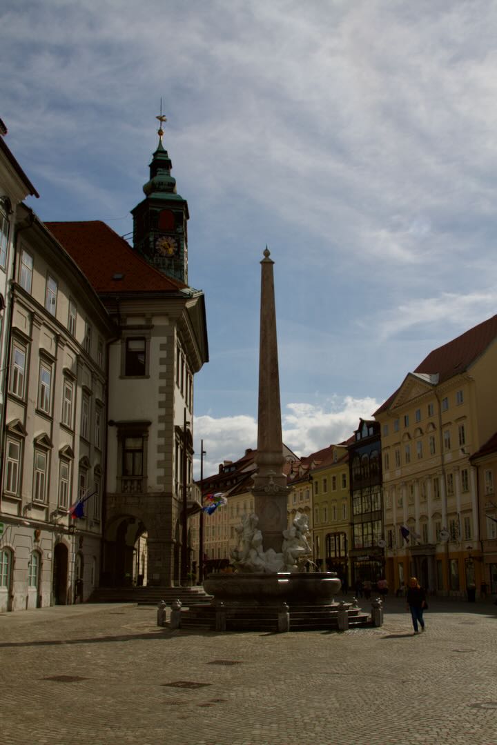 Robba Fountain obelisk and the Town Hall clock tower on Town Square