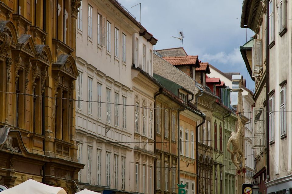 Row of ornate old facades along a street