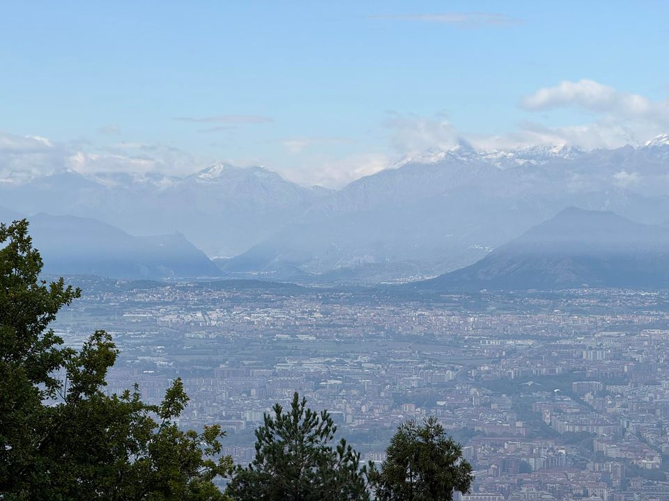 Turin spread out below the snow-capped Alps